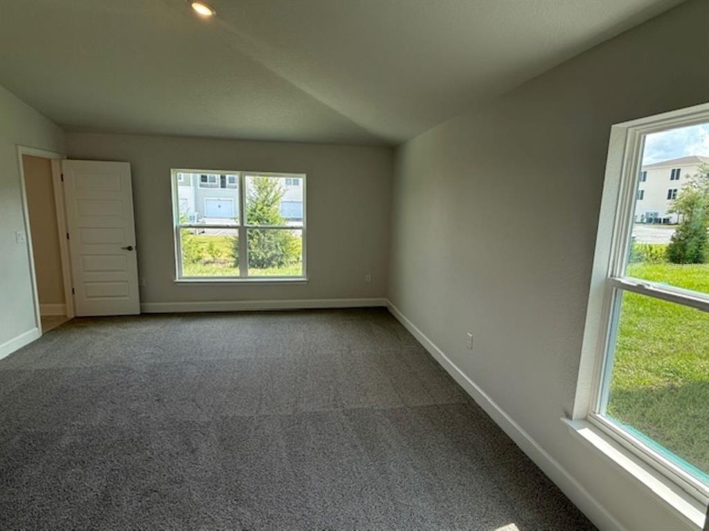 2150 Northwest 23rd Loop Ocala, FL 34475 - Photo 18 of 19 an empty room with windows