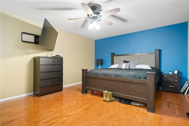 a bedroom with a bed and furniture