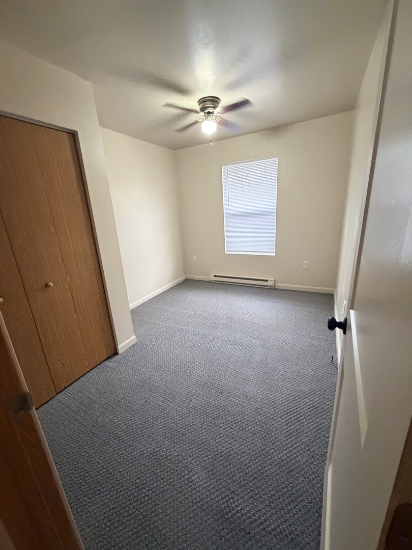 25731 West Bridge Street, Unit 3 Channahon, IL 60410 - Photo 5 of 7 a view of an empty room
