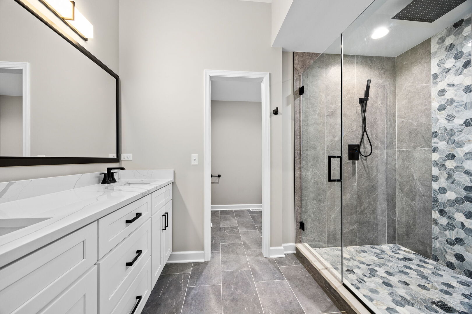 9704 Captains Drive Algonquin, IL 60102 - Photo 12 of 35 a bathroom with a double vanity sink a mirror and shower