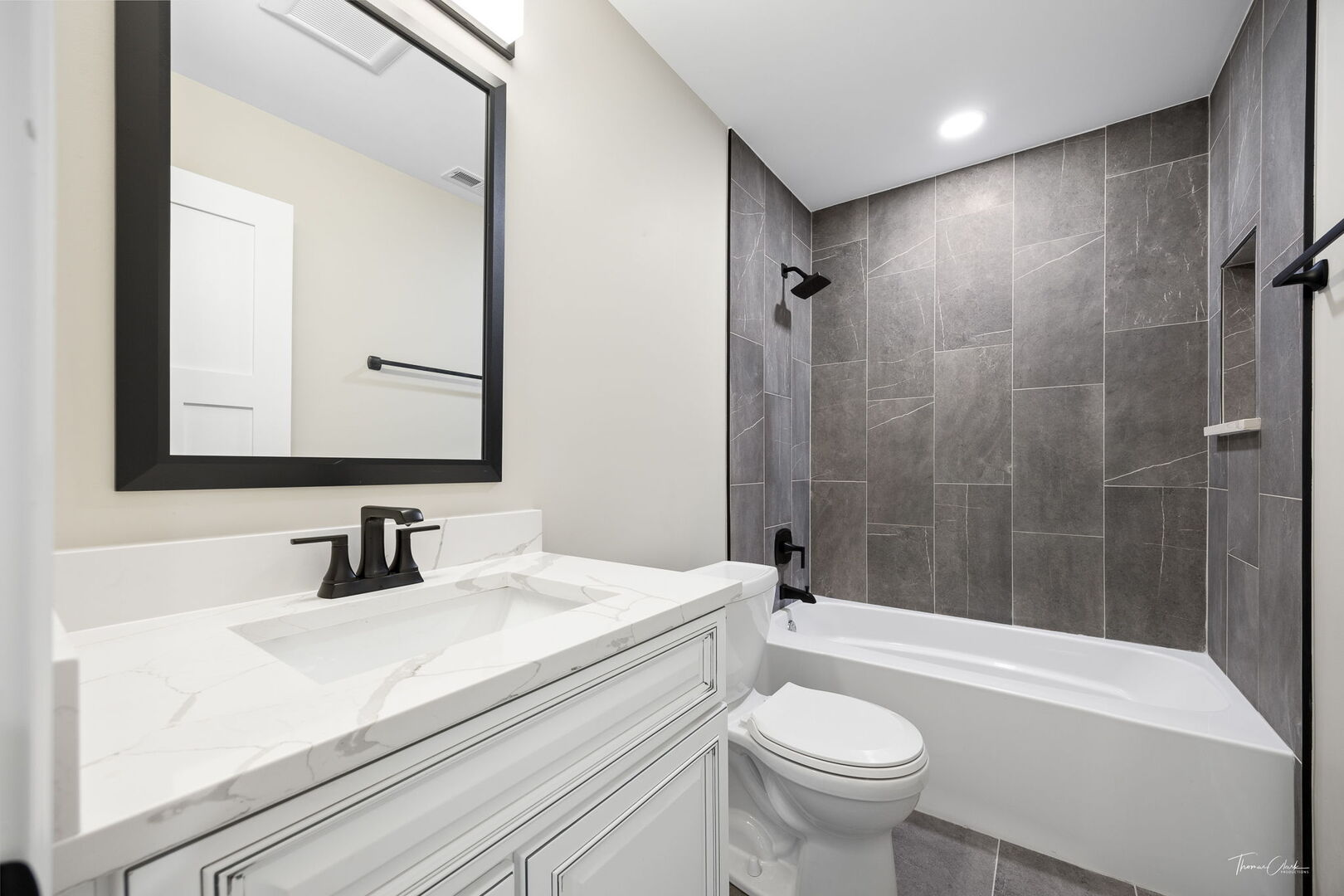9704 Captains Drive Algonquin, IL 60102 - Photo 19 of 35 a bathroom with a sink a toilet and shower