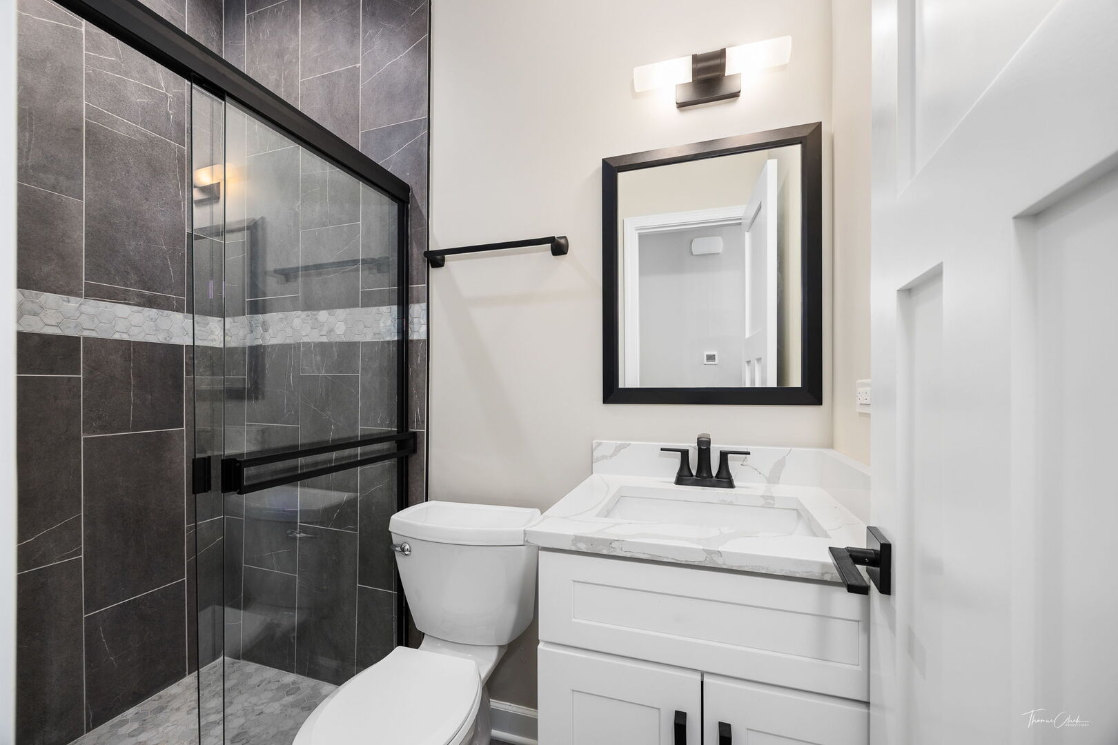 9704 Captains Drive Algonquin, IL 60102 - Photo 22 of 35 a bathroom with a toilet sink and shower