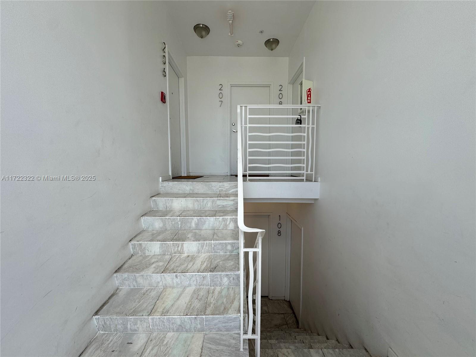810 7th Street, Unit 207 Miami Beach, FL 33139 - Photo 12 of 15 Condo Stairs