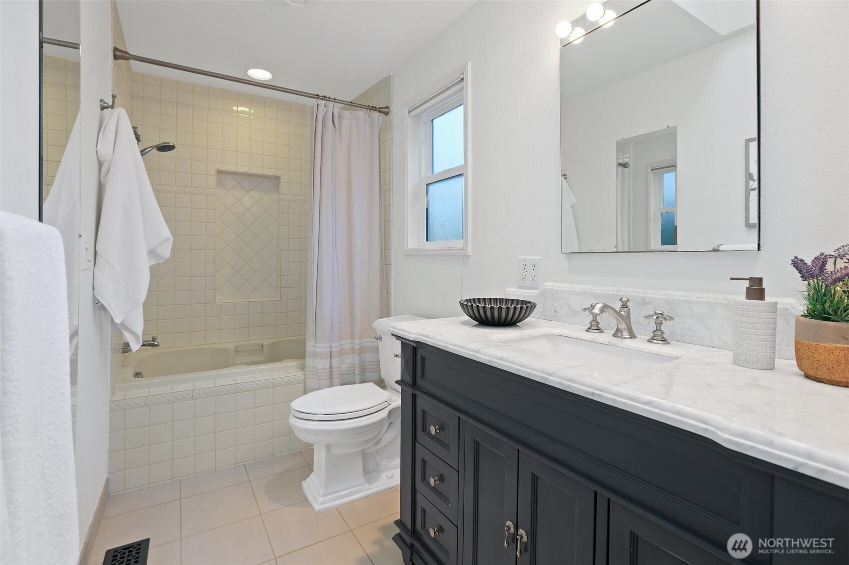 975 Northwest Inneswood Place Issaquah, WA 98027 - Photo 12 of 21 a bathroom with a granite countertop sink toilet and shower