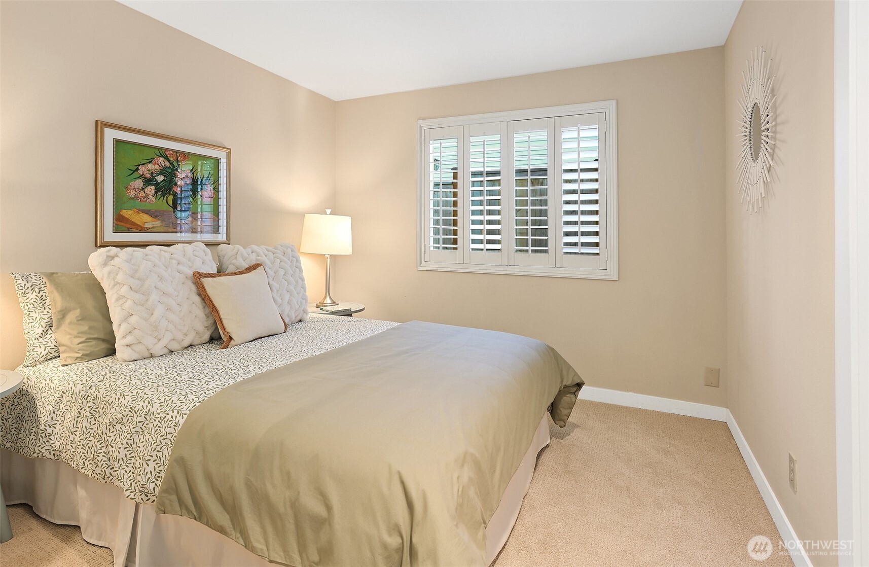 975 Northwest Inneswood Place Issaquah, WA 98027 - Photo 15 of 21 a bedroom with a bed and a window