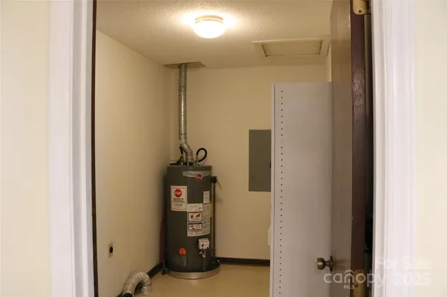 a room with refrigerator and wall