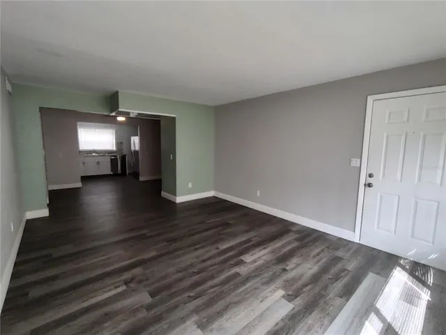 a view of gallery with wooden floor