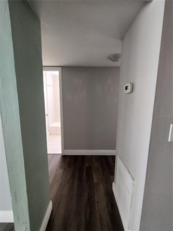 320 West Howry Avenue, Unit 1 Deland, FL 32720 - Photo 14 of 33 a view of small space with wooden floor