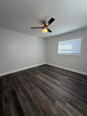 a view of wooden floor and wooden floor in a room