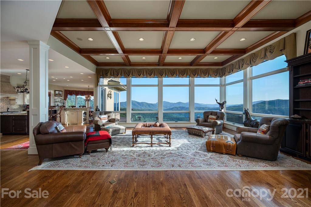 125 Stone Brook Trail Black Mountain, NC 28711 - Photo 13 of 48 a living room with fireplace furniture and a large window