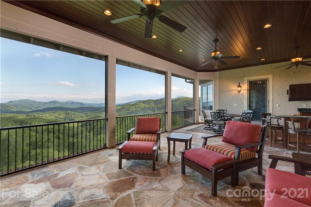 125 Stone Brook Trail Black Mountain, NC 28711 - Photo 20 of 48 a outdoor space with patio furniture and a potted plant