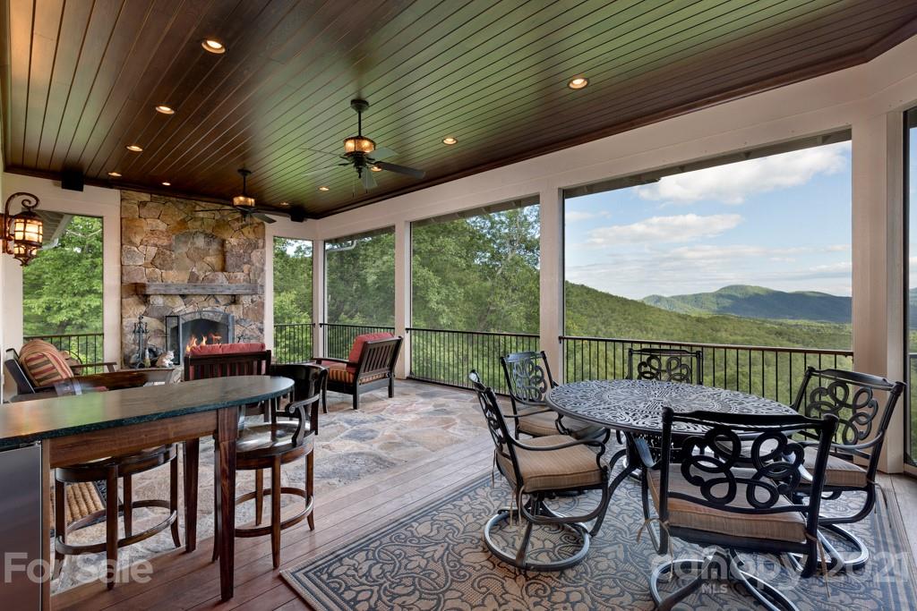 125 Stone Brook Trail Black Mountain, NC 28711 - Photo 21 of 48 a view of a dining room with furniture window and outside view