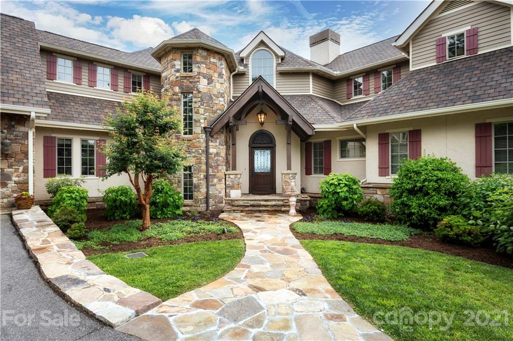 125 Stone Brook Trail Black Mountain, NC 28711 - Photo 10 of 48 front view of a house with a yard