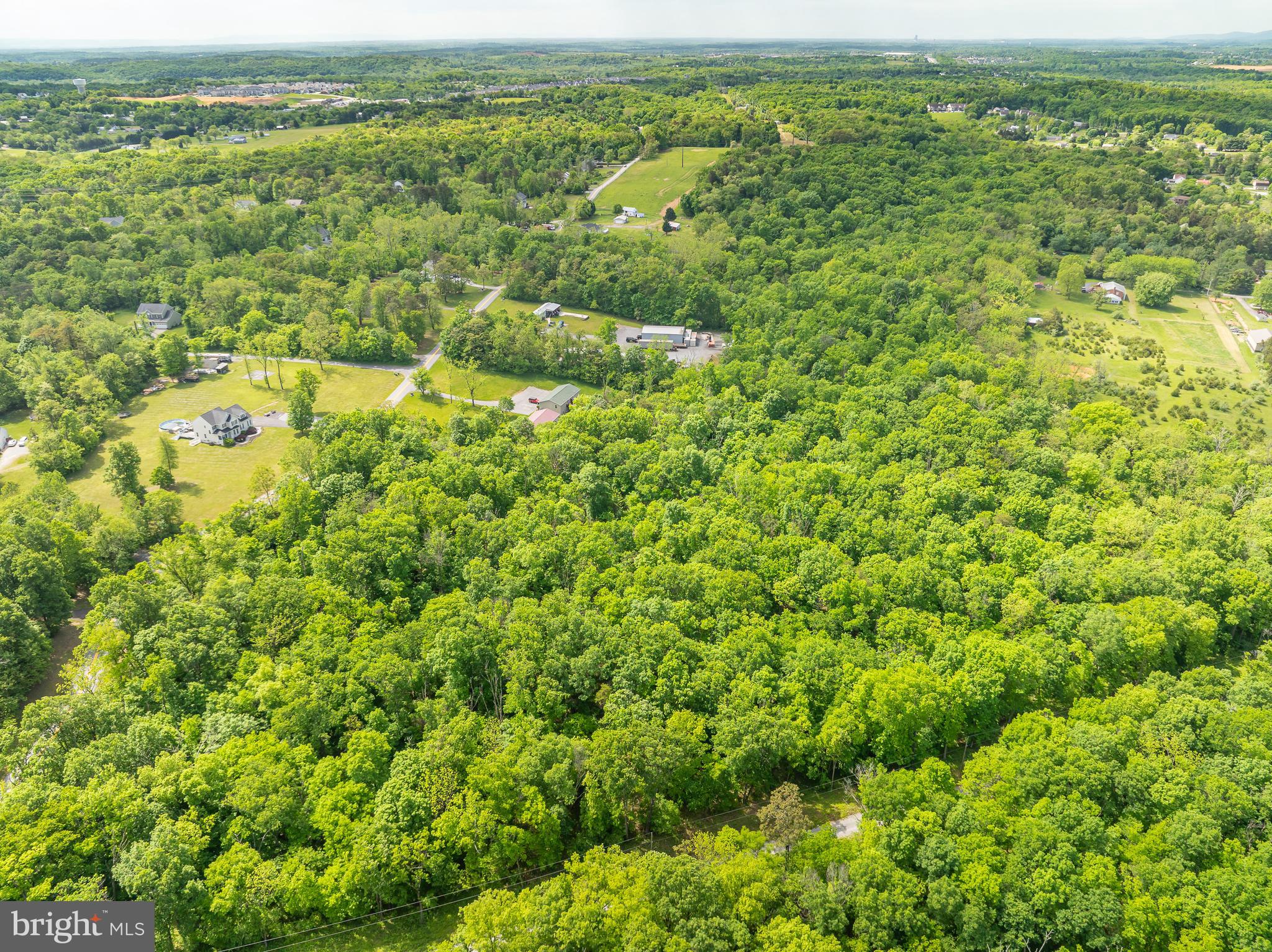 Lot 33 Nestle Quarry Road Falling Waters, WV 25419 - Photo 23 of 27 an aerial view of residential houses with outdoor space and trees