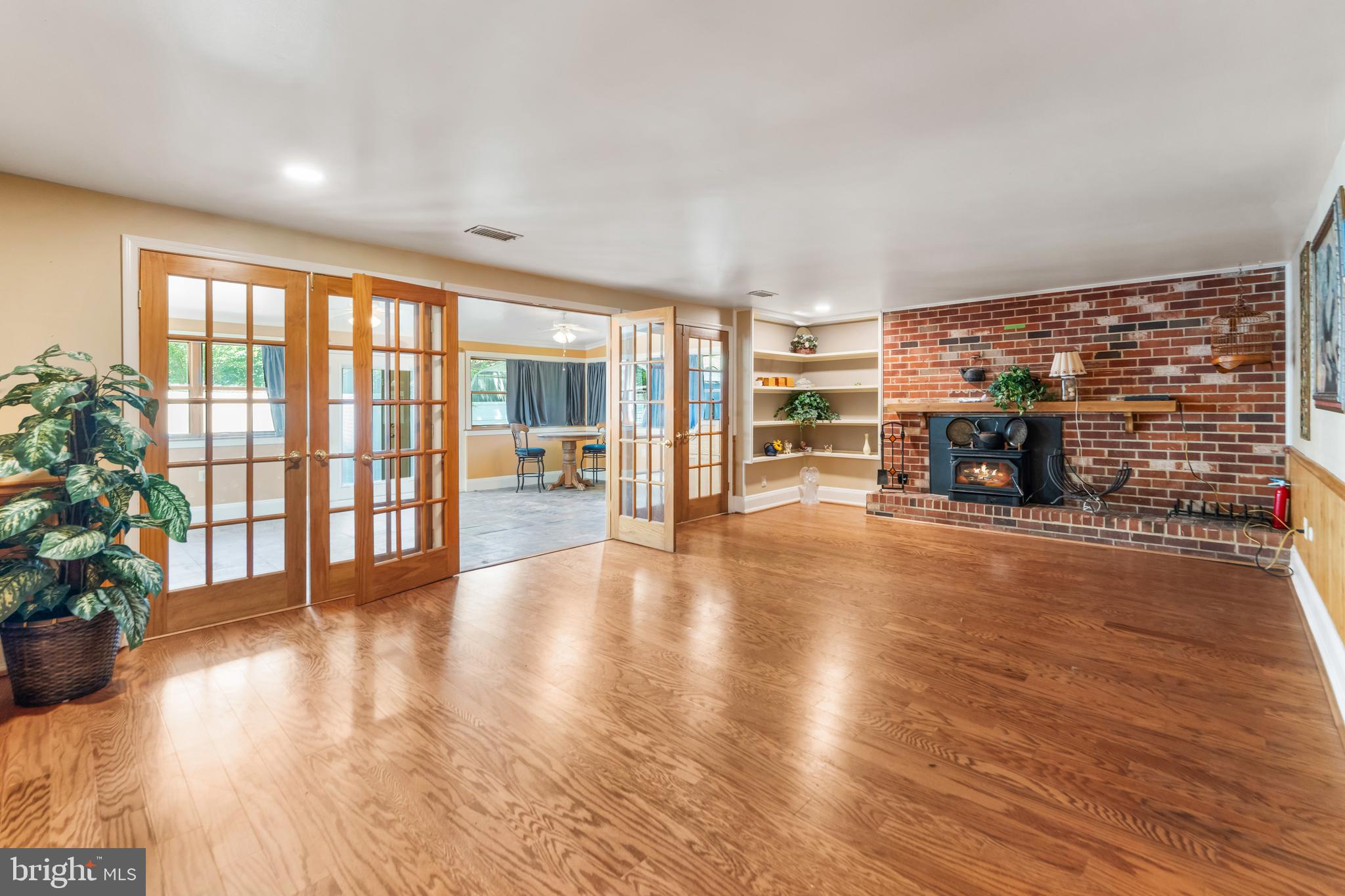 5922 Michael Road Waldorf, MD 20601 - Photo 27 of 43 a view of a living room with furniture and wooden floor