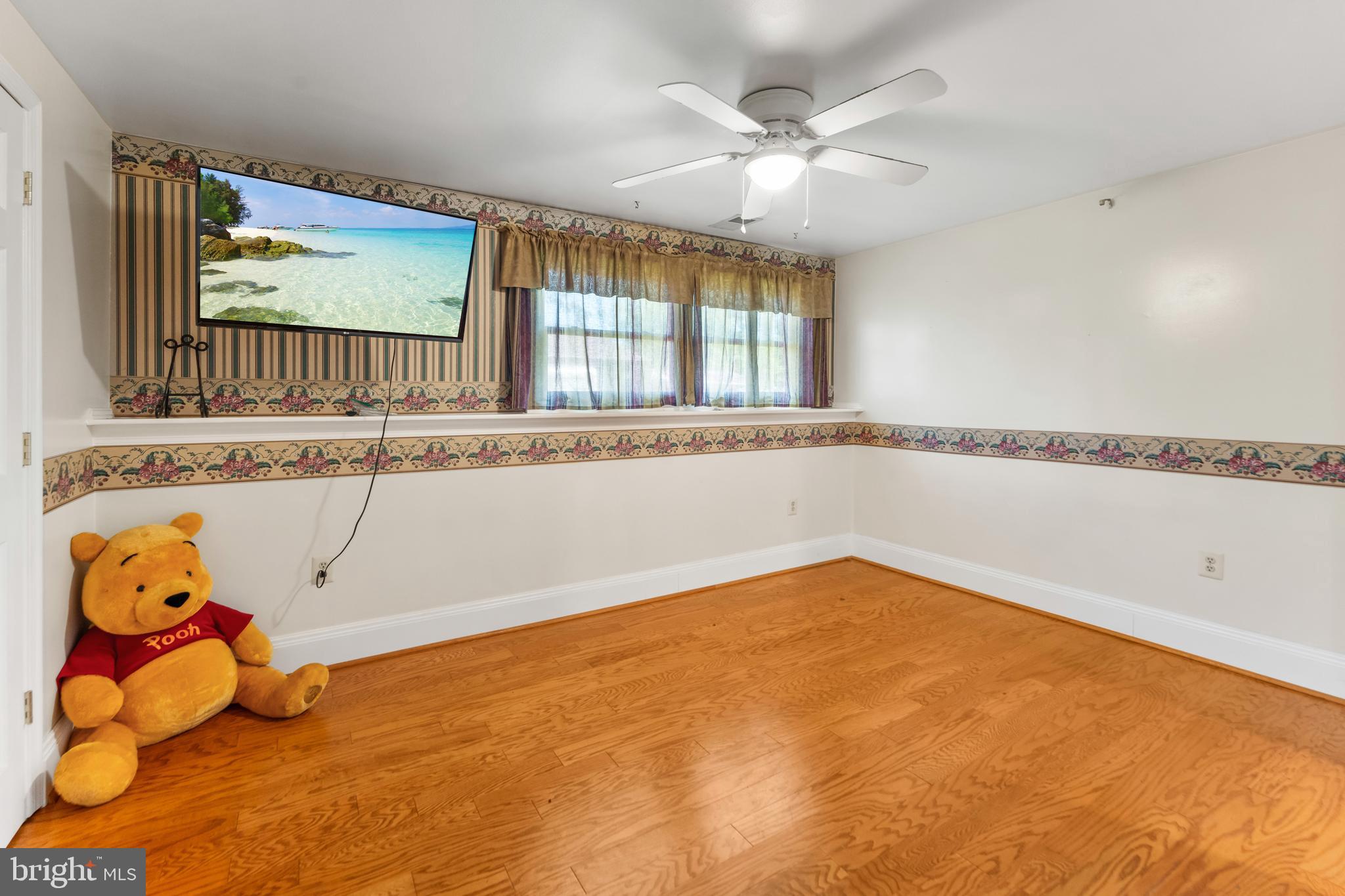 5922 Michael Road Waldorf, MD 20601 - Photo 33 of 43 a view of a room with window and a ceiling fan