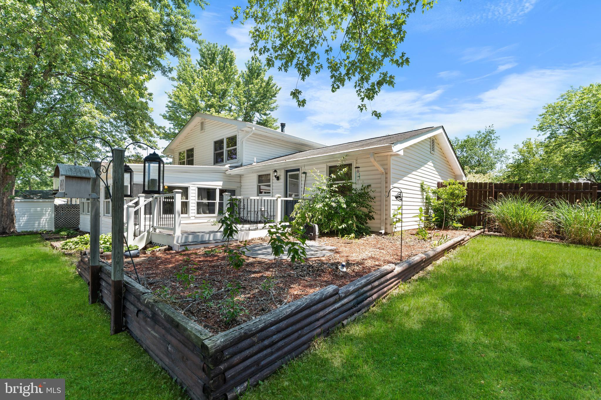 5922 Michael Road Waldorf, MD 20601 - Photo 39 of 43 a front view of a house with garden