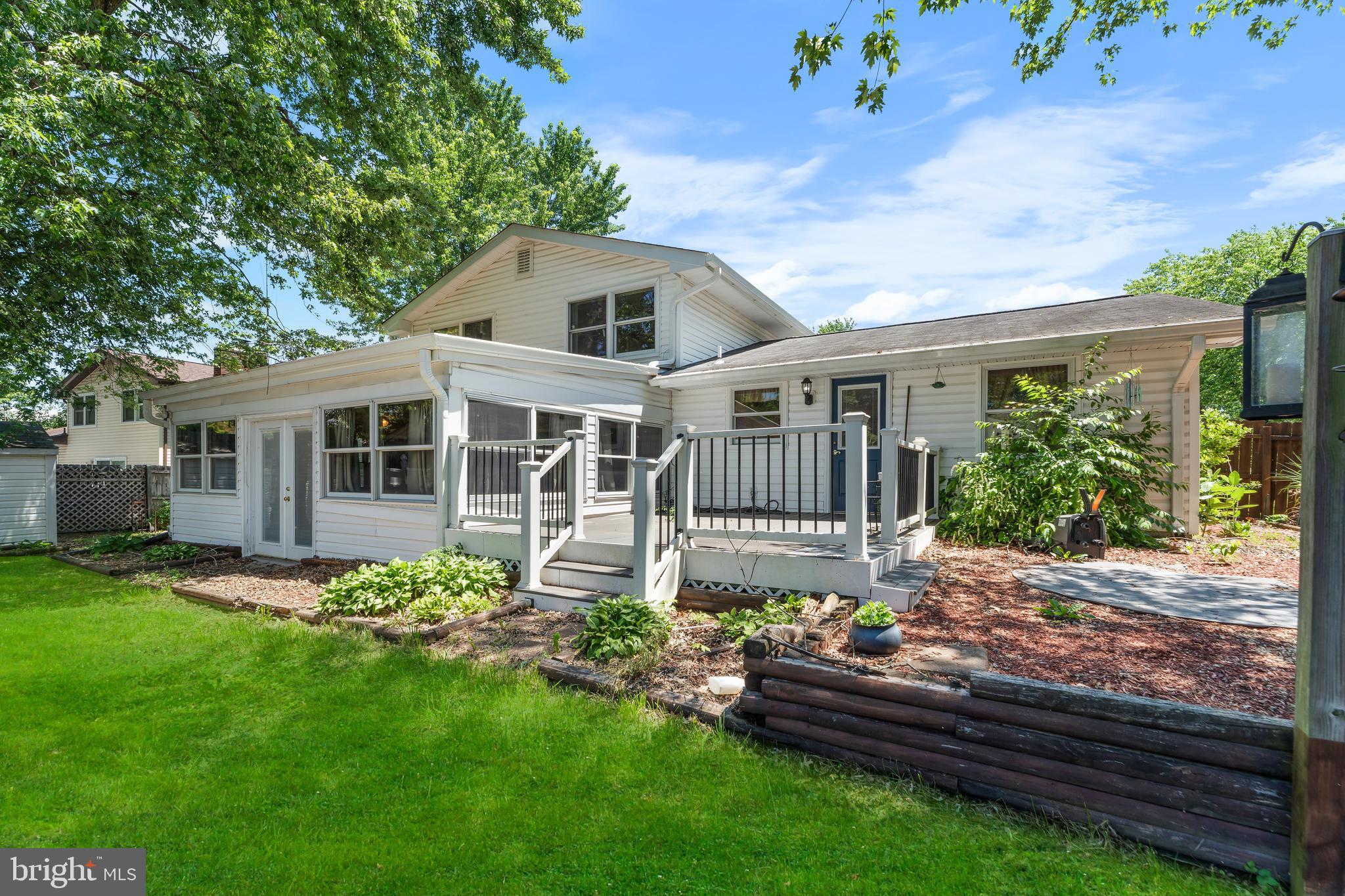 5922 Michael Road Waldorf, MD 20601 - Photo 40 of 43 a front view of a house with a yard