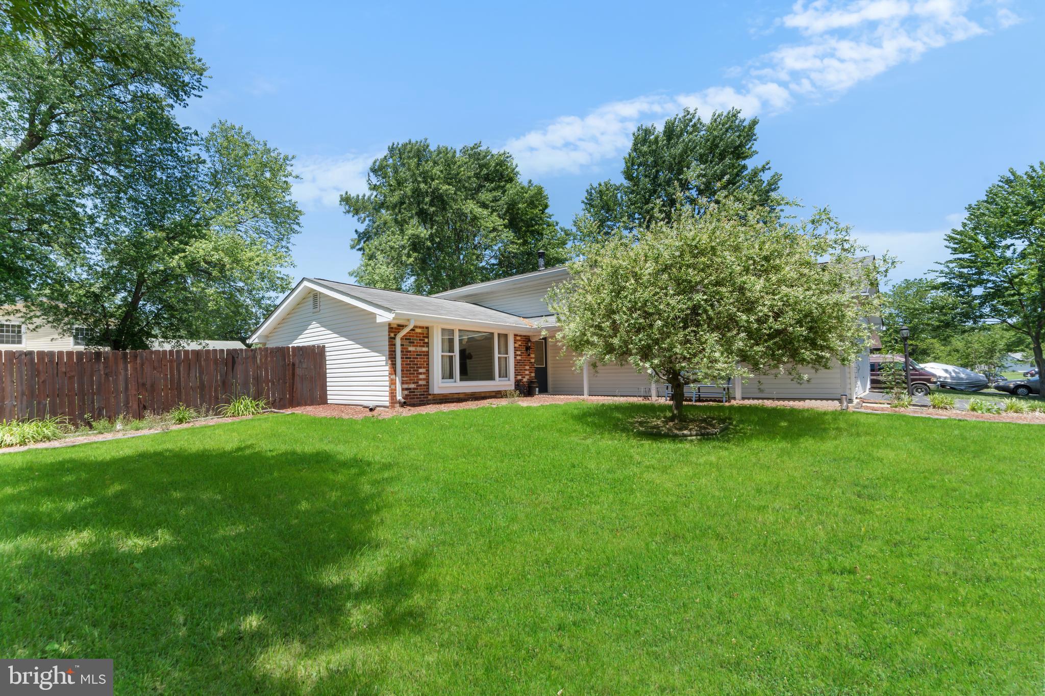 5922 Michael Road Waldorf, MD 20601 - Photo 5 of 43 a front view of a house with garden
