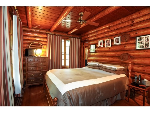 4452 West Edgewood Road Dixon, IL 61021 - Photo 12 of 25 a bedroom with a bed and a dresser