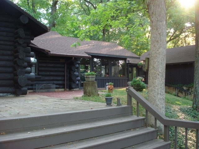 4452 West Edgewood Road Dixon, IL 61021 - Photo 18 of 25 a backyard of a house with barbeque oven and outdoor seating