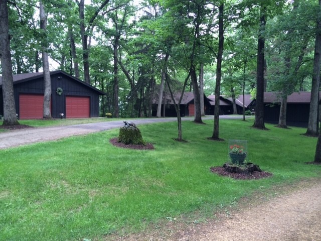 4452 West Edgewood Road Dixon, IL 61021 - Photo 3 of 25 a view of a backyard with large trees
