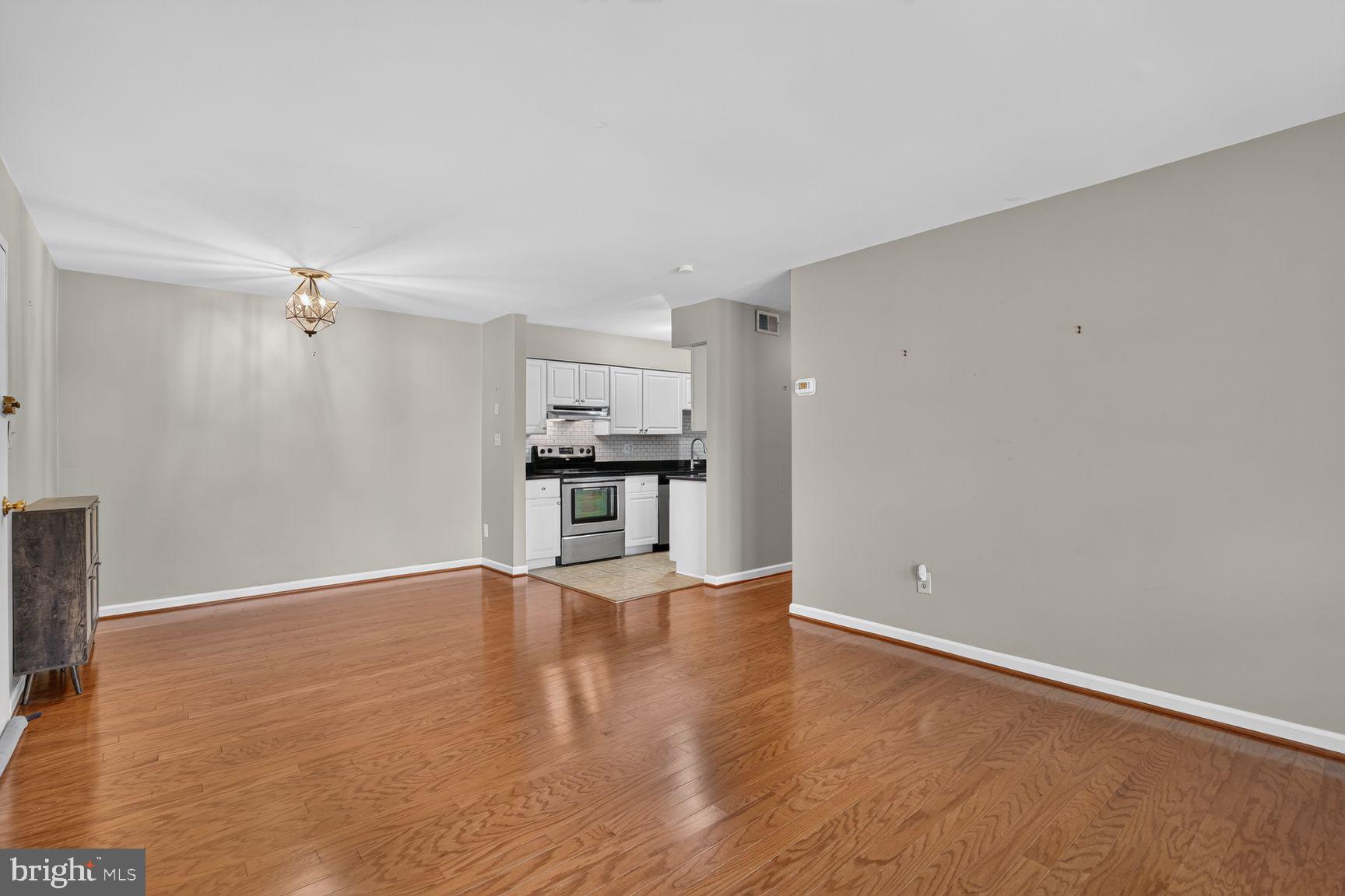 8358 K Dunham Court, Unit 627 Springfield, VA 22152 - Photo 4 of 15 Entry, dining & living areas
