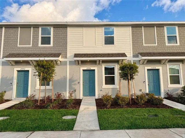 a view of a kitchen with cabinets