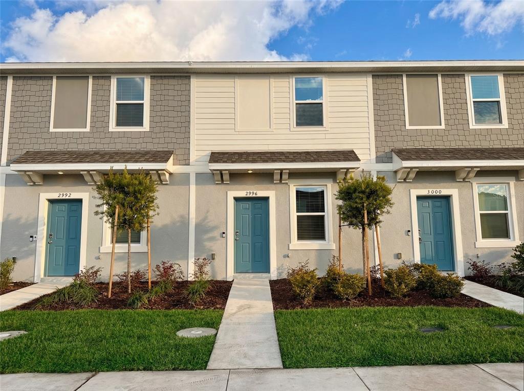 front view of a house and a yard