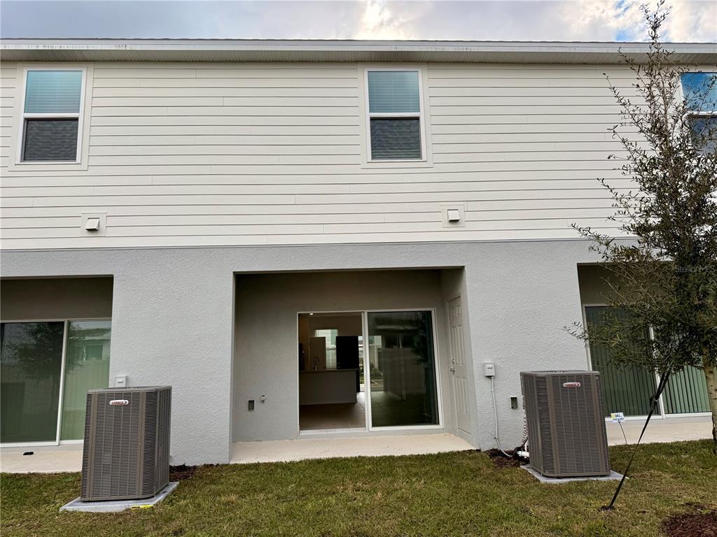 2996 Skyline Loop Kissimmee, FL 34758 - Photo 8 of 26 a view of a white house