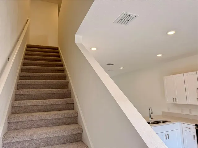 a view of hallway with stairs