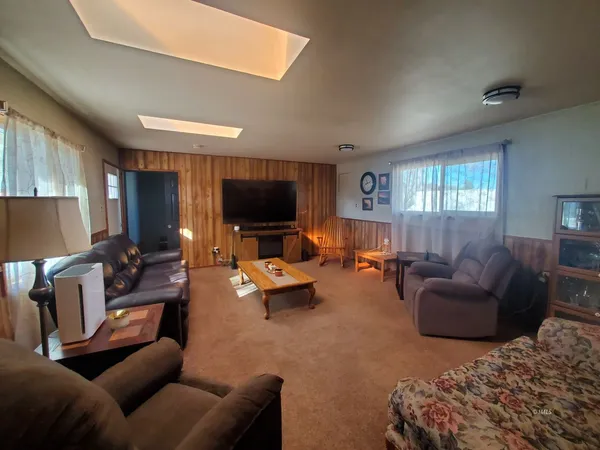 a view of a hallway with a tv