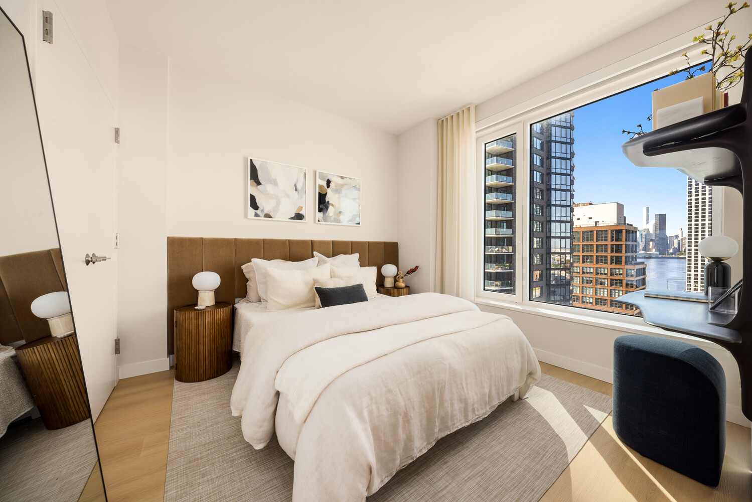 18 India Street, Unit 704S Brooklyn, NY 11222 - Photo 4 of 18 a bedroom with a bed and a couch