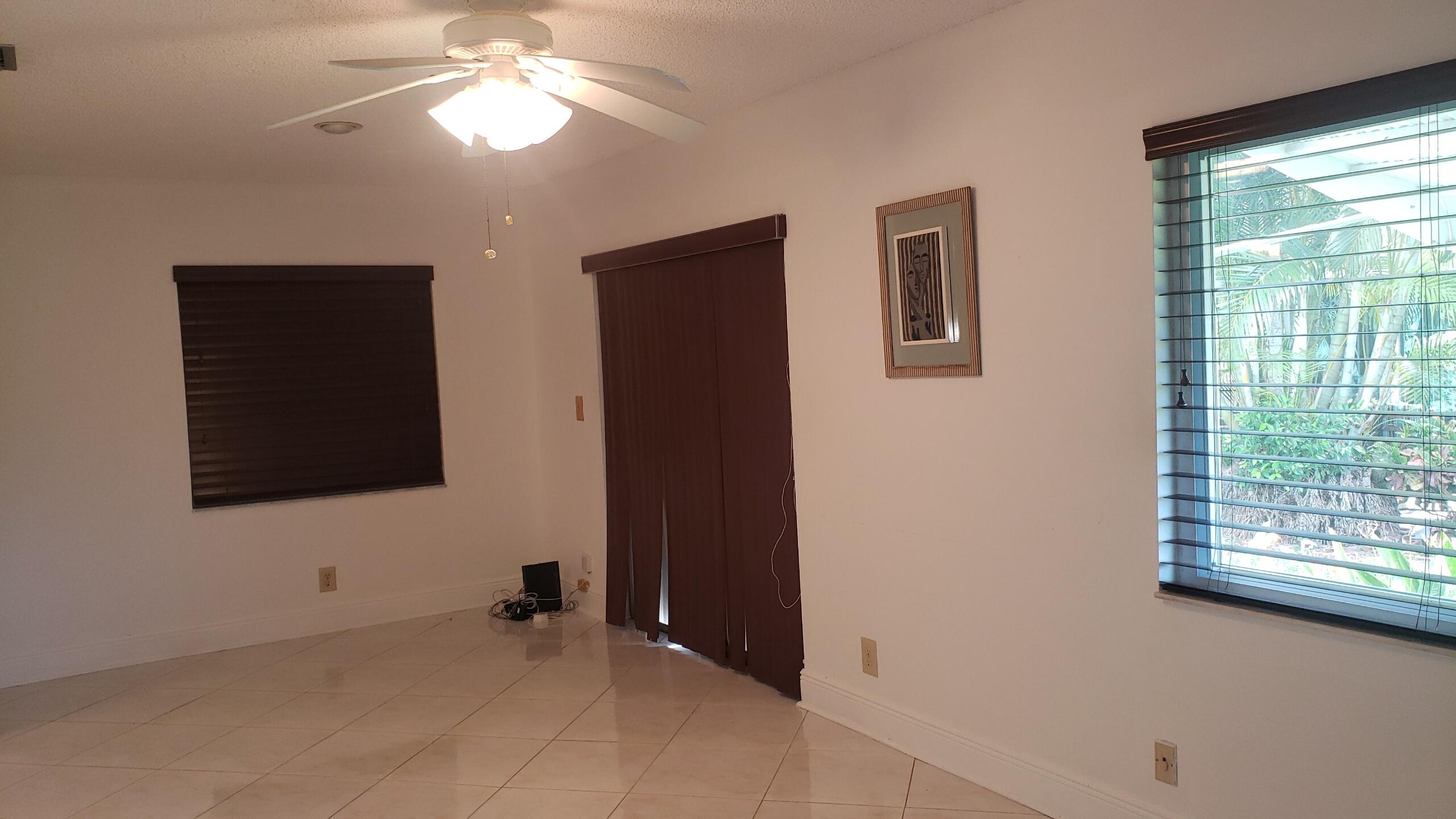 6085 Stanley Lane Delray Beach, FL 33484 - Photo 12 of 22 a view of an empty room with a window