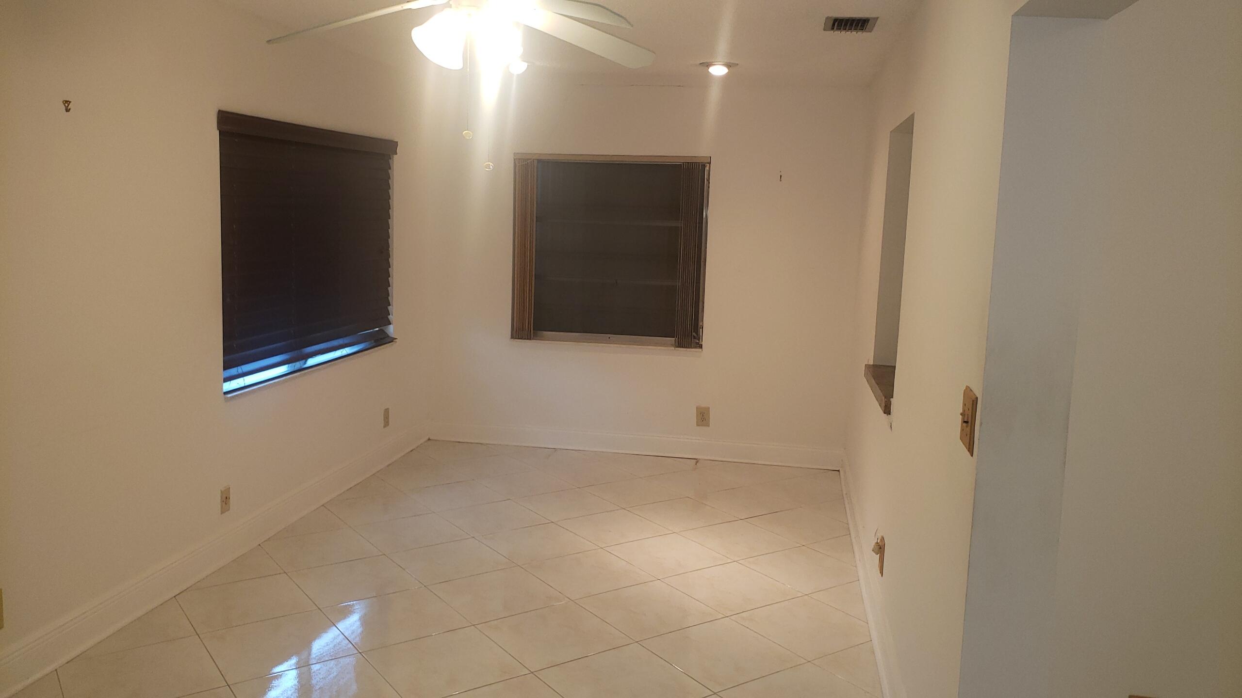 6085 Stanley Lane Delray Beach, FL 33484 - Photo 13 of 22 a view of an empty room