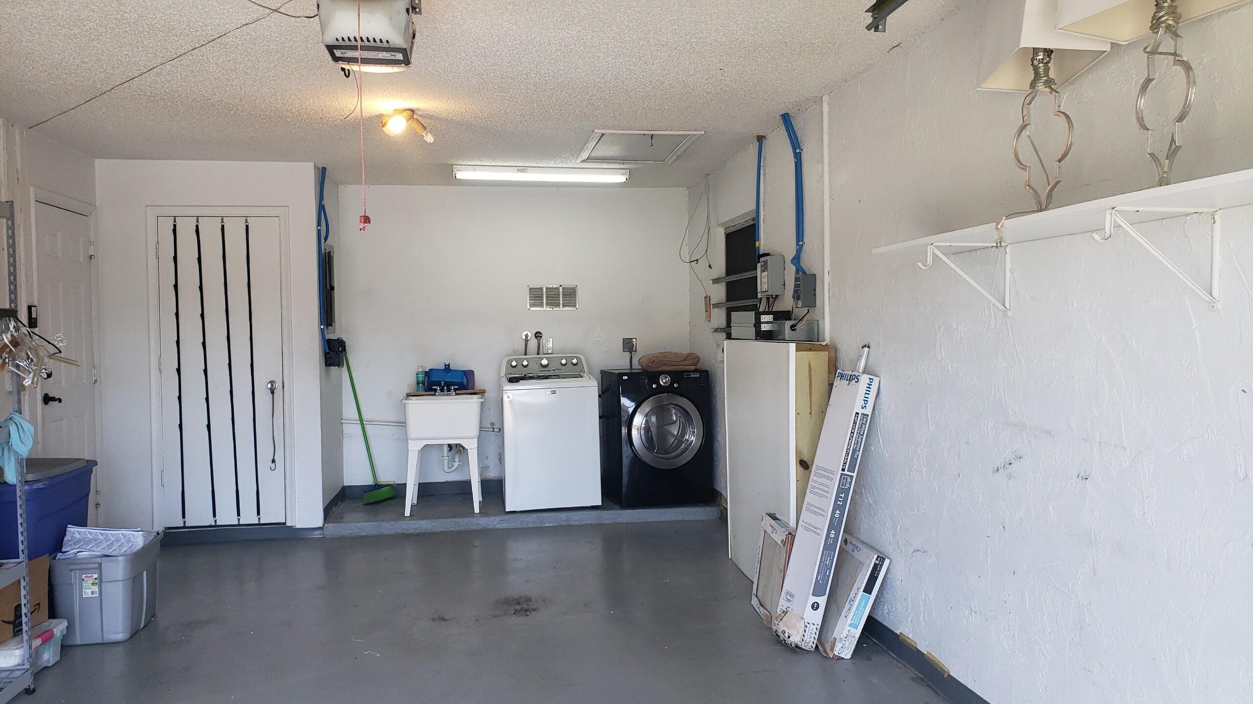 6085 Stanley Lane Delray Beach, FL 33484 - Photo 14 of 22 a view of a storage & utility room with a sink