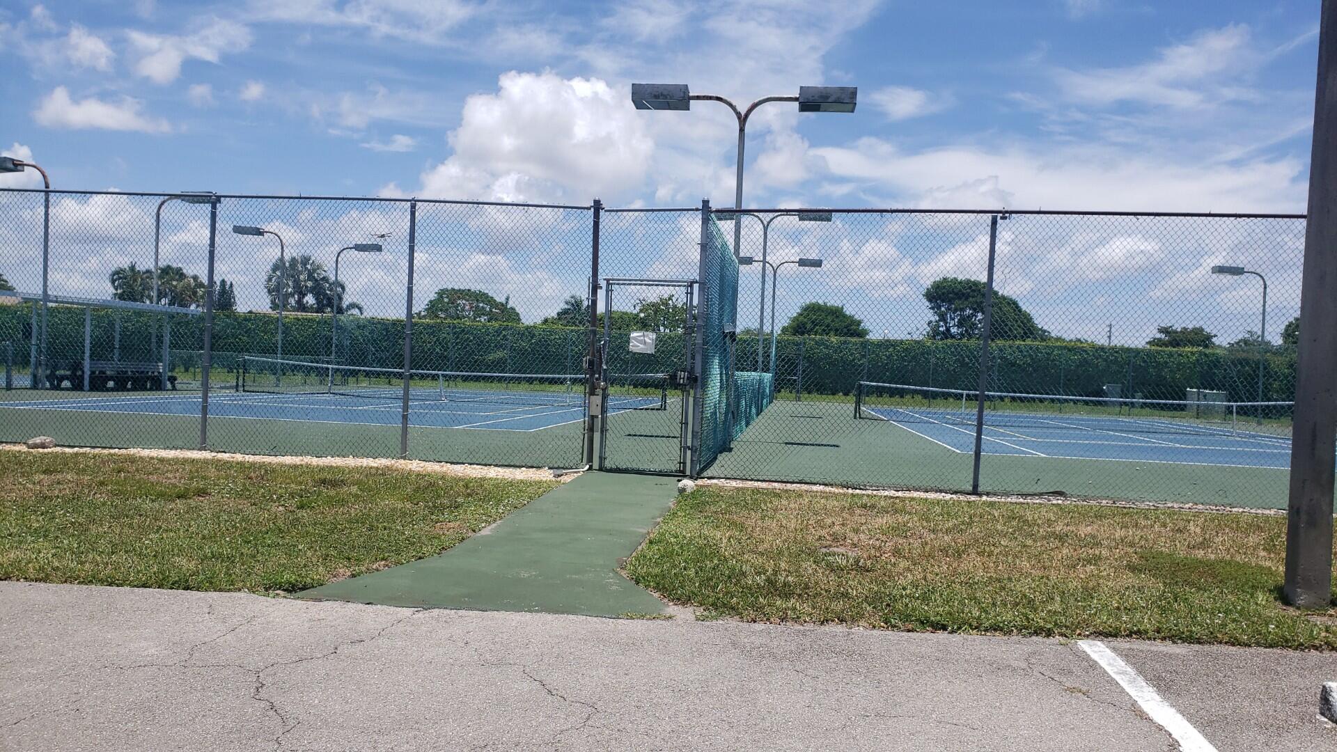 6085 Stanley Lane Delray Beach, FL 33484 - Photo 20 of 22 a view of a fence