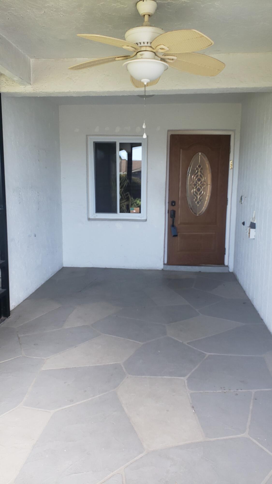 6085 Stanley Lane Delray Beach, FL 33484 - Photo 2 of 22 a view of an empty room with a window