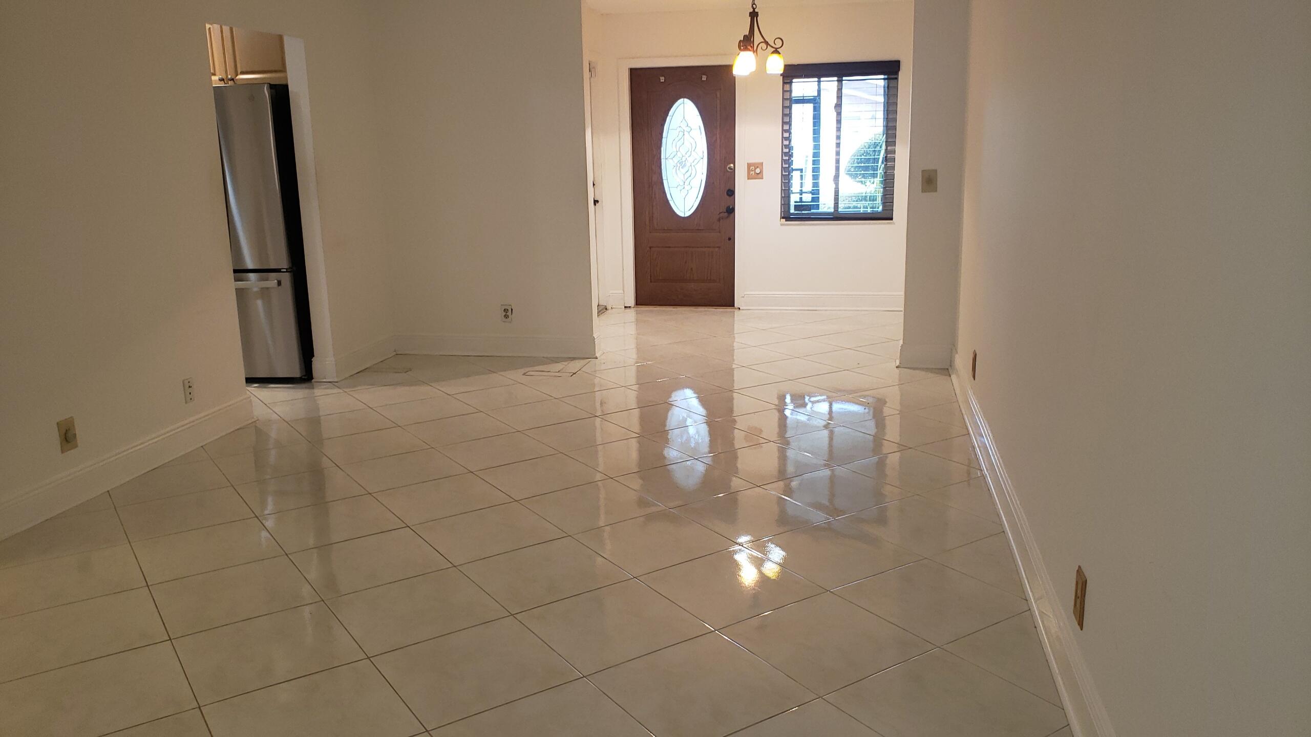 6085 Stanley Lane Delray Beach, FL 33484 - Photo 3 of 22 a view of a livingroom with window