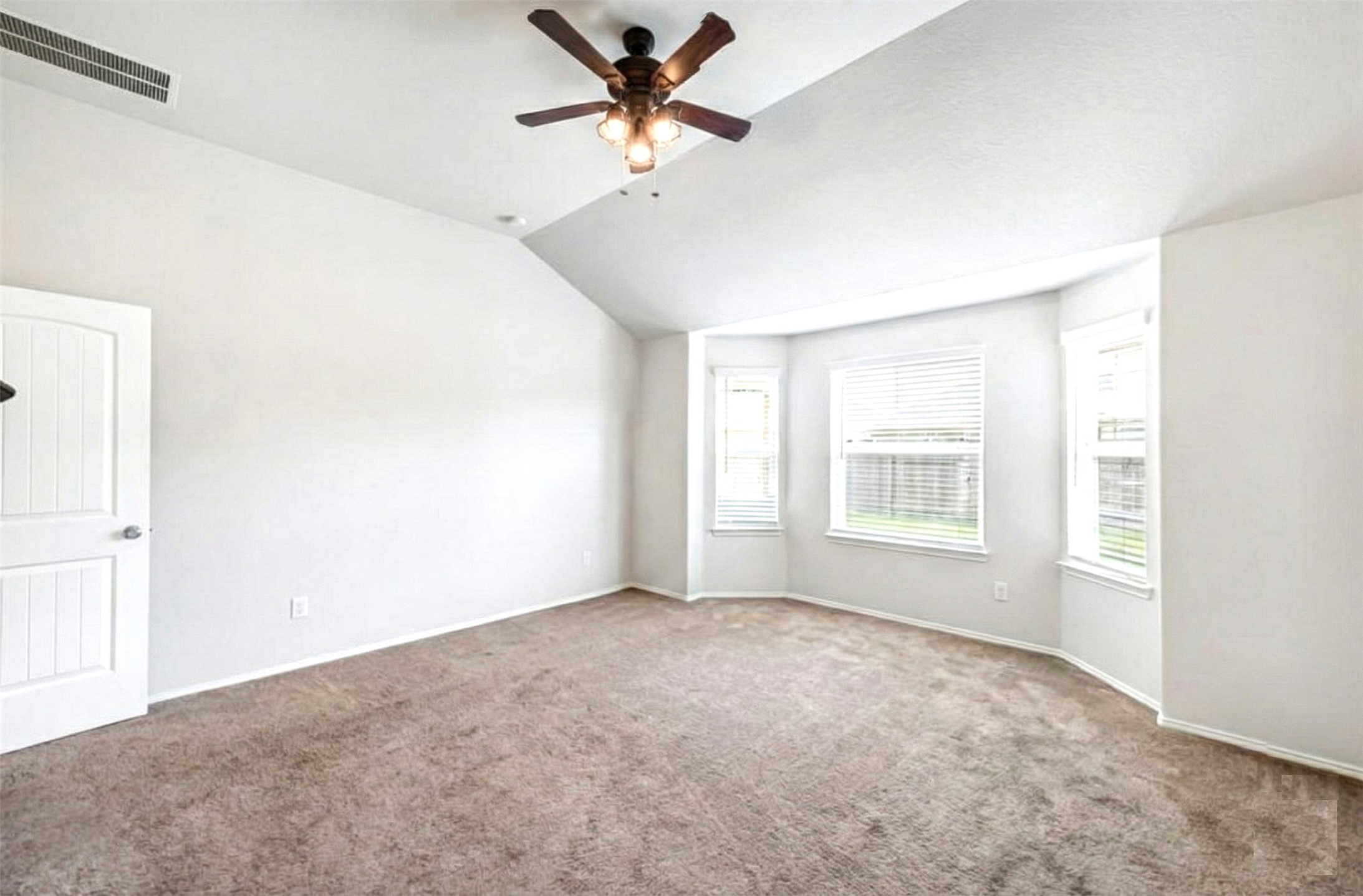 17439 Chester Valley Trail Hockley, TX 77447 - Photo 10 of 22 This spacious, bright room features neutral carpeting, a vaulted ceiling with a ceiling fan, and a bay window area providing ample natural light.