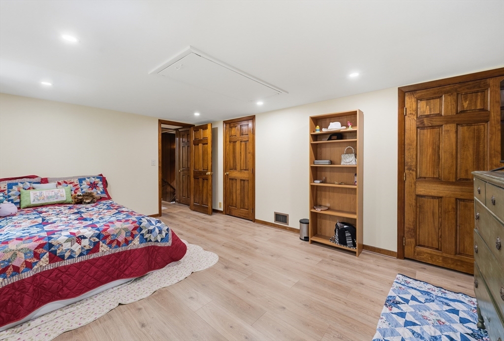 43 Flint Road Tyngsborough, MA 01879 - Photo 19 of 40 a bedroom with a bed and a window