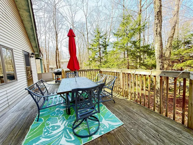 a bed room with a bed and furniture