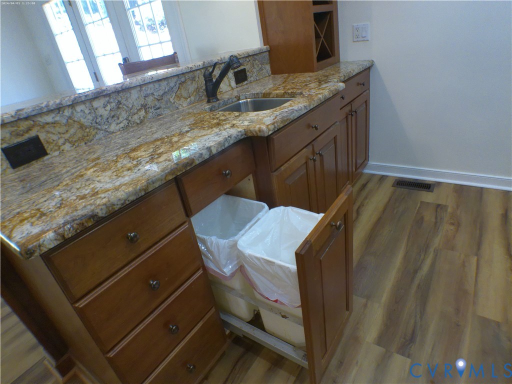 9418 North Rinker Drive Mechanicsville, VA 23116 - Photo 17 of 29 1 of 2 Trash Can Cabinets