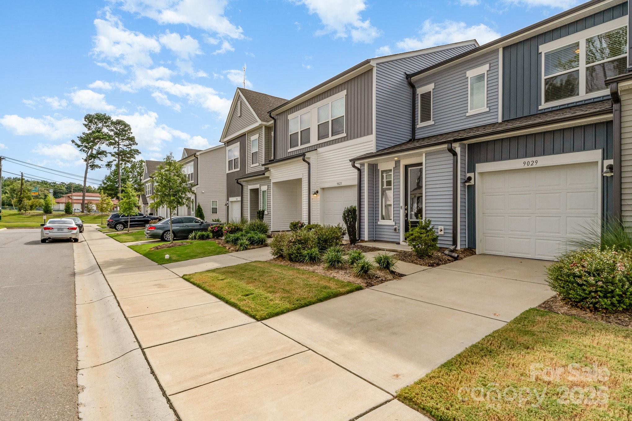 9029 Widden Way Charlotte, NC 28269 - Photo 20 of 29 a view of a street with buildings