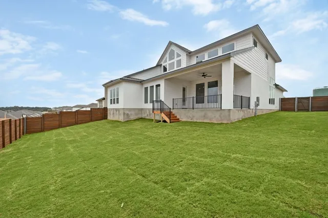 a front view of house with yard and seating area
