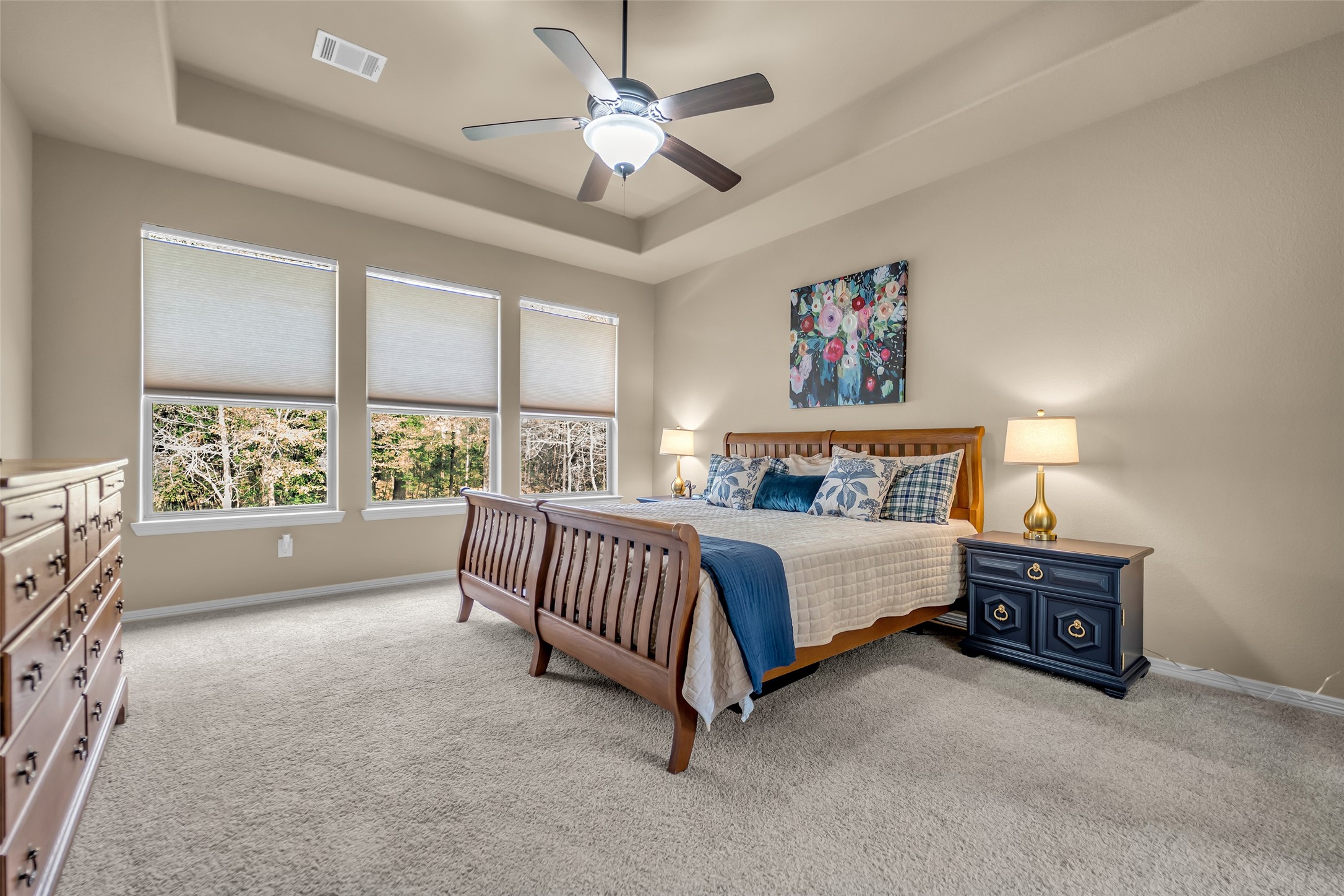 14752 Highland Ranch Drive Montgomery, TX 77316 - Photo 23 of 39 a spacious bedroom with a bed and a large window