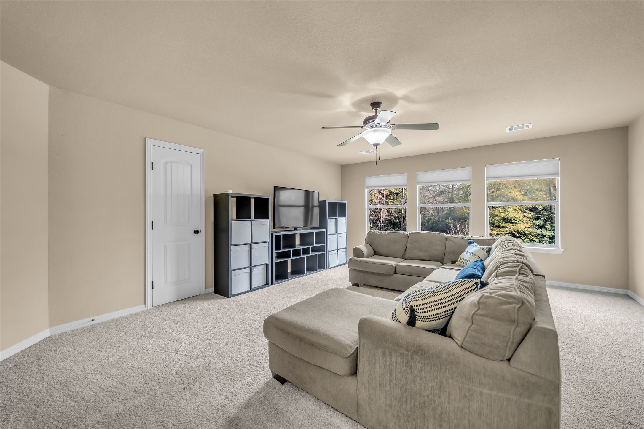 14752 Highland Ranch Drive Montgomery, TX 77316 - Photo 27 of 39 a living room with furniture and a large window