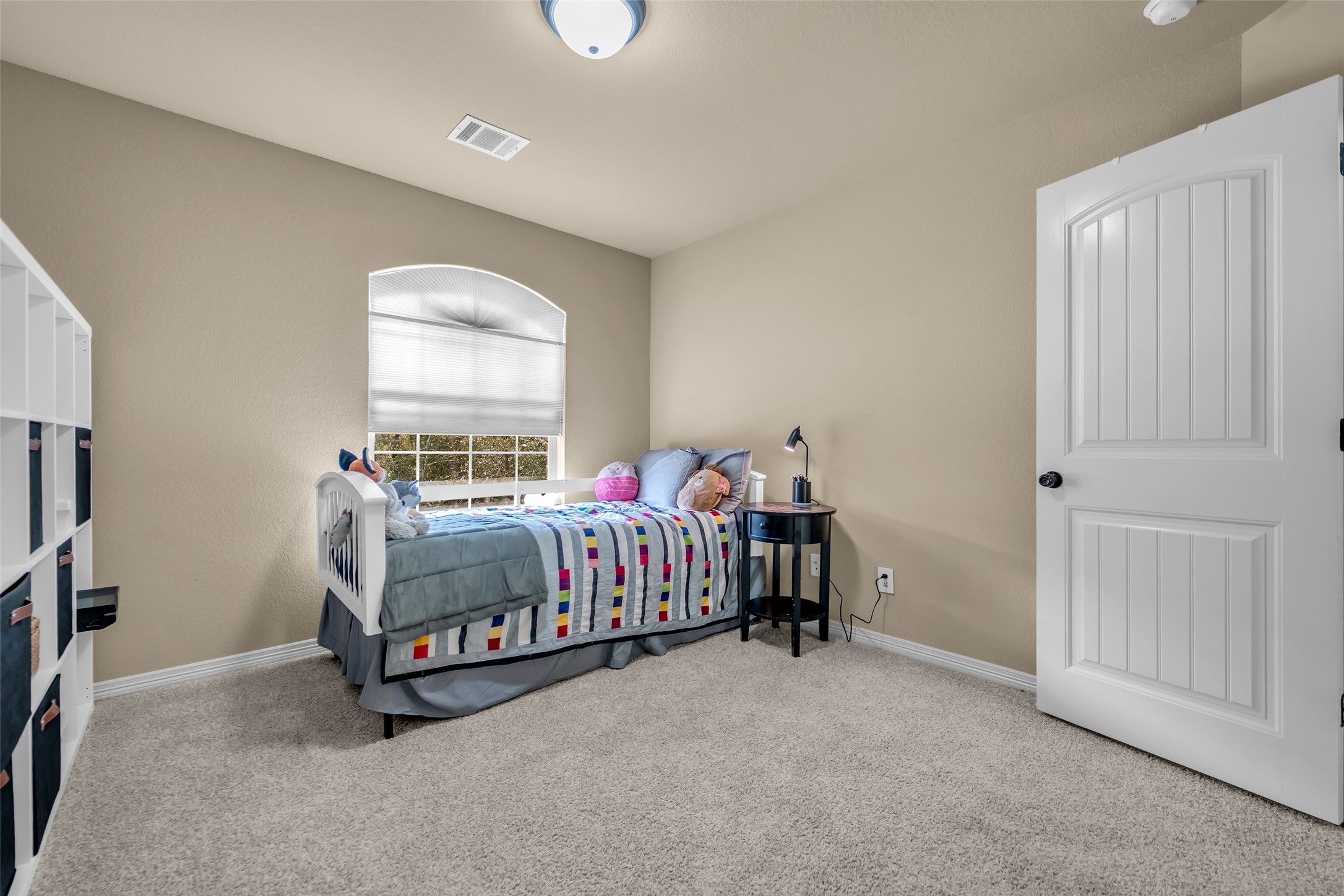 14752 Highland Ranch Drive Montgomery, TX 77316 - Photo 31 of 39 a bedroom with a bed and a window