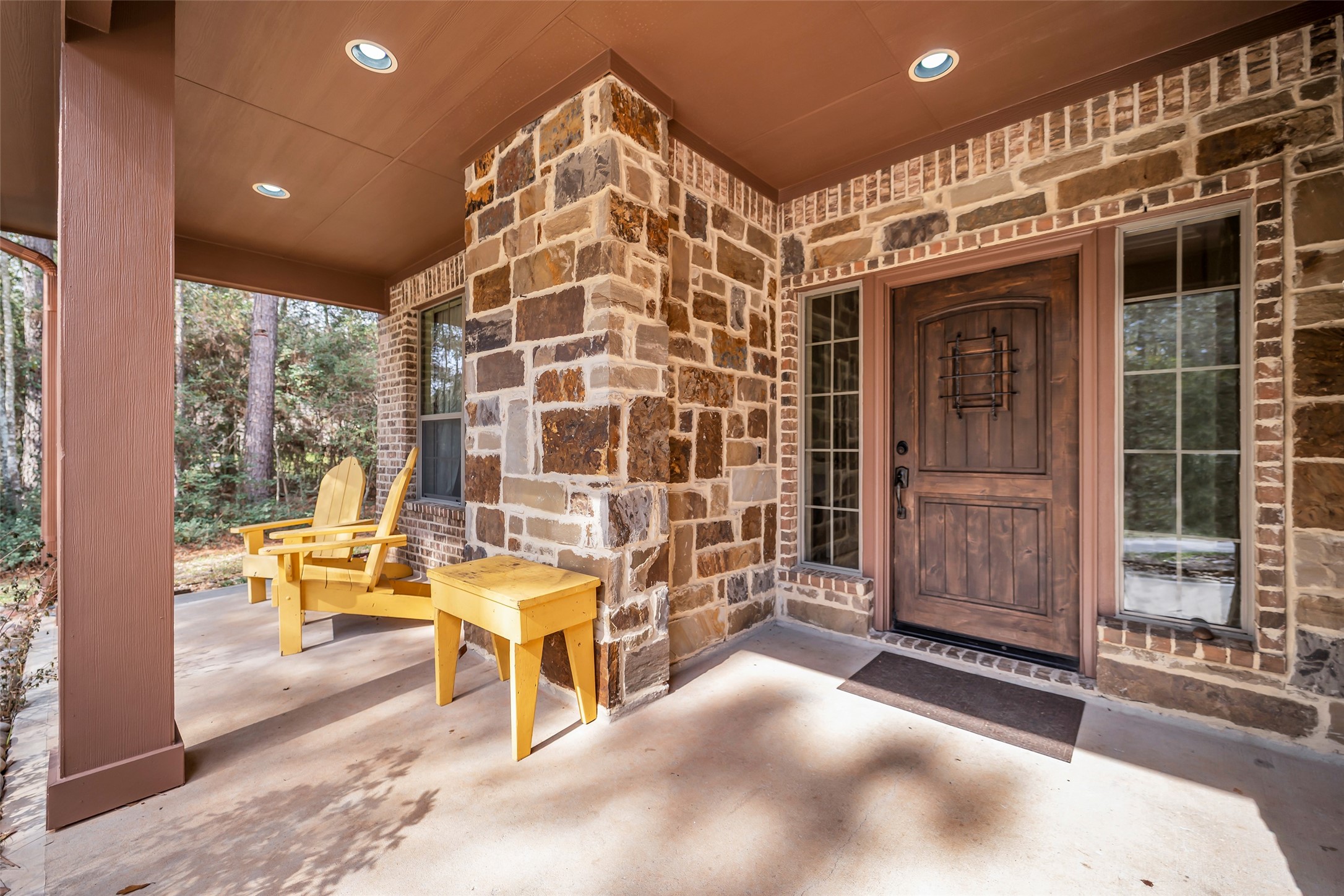 14752 Highland Ranch Drive Montgomery, TX 77316 - Photo 9 of 39 a view of a balcony with couch and wooden floor