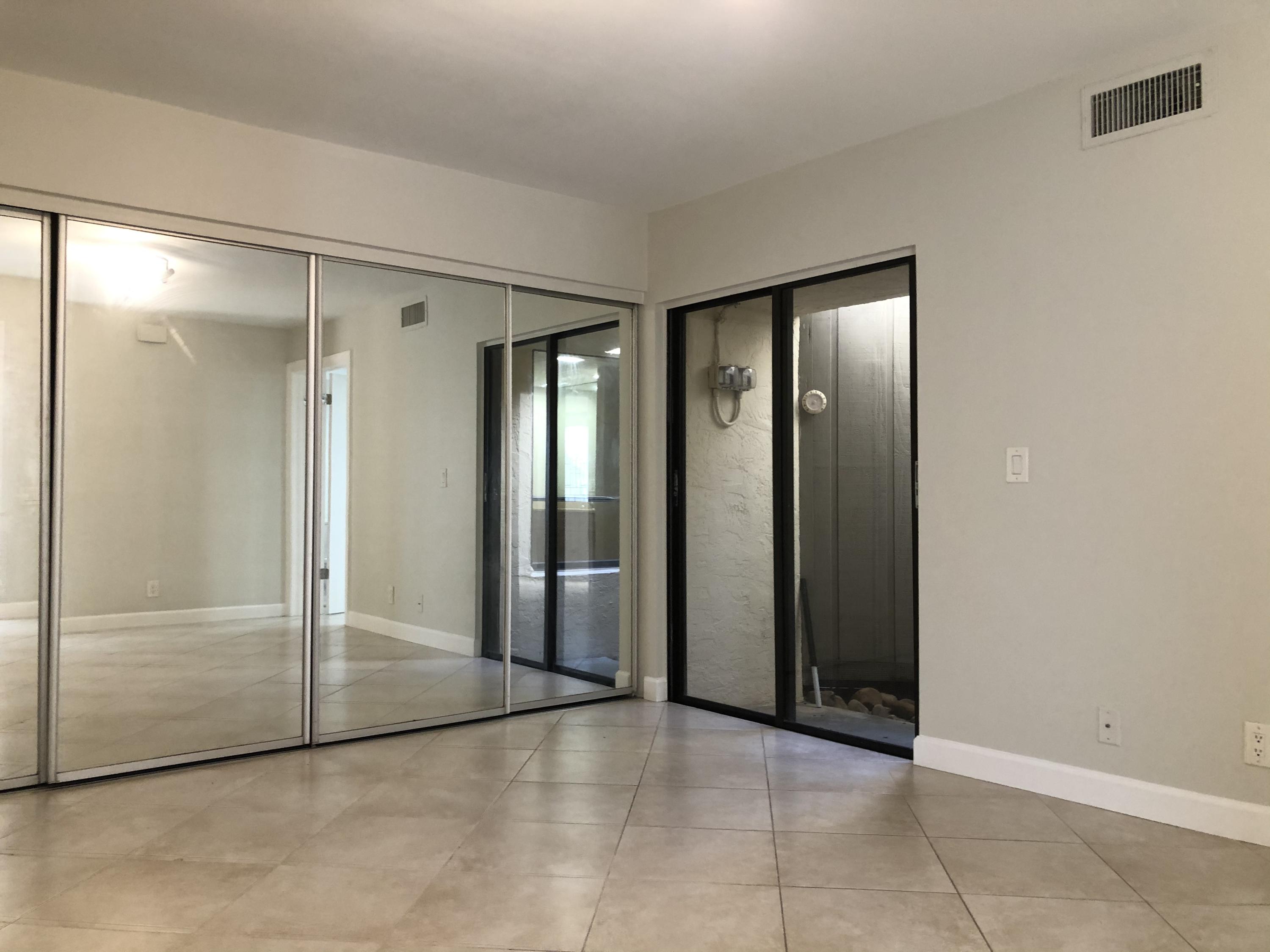 1605 Highway 1, Unit 14C Jupiter, FL 33477 - Photo 15 of 32 Master Bedroom